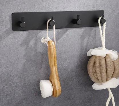 Self-adhesive towel hooks