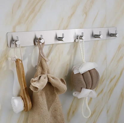 Self-adhesive towel hooks